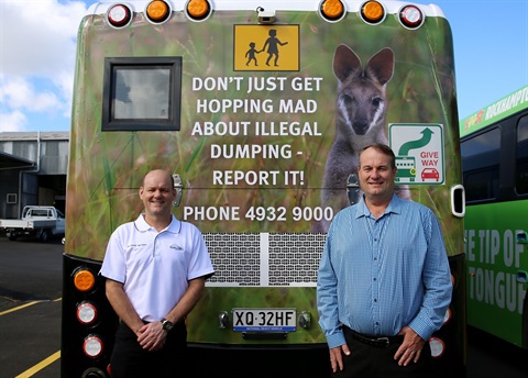 Cr Mathers and Cr Latcham with campaign bus advert