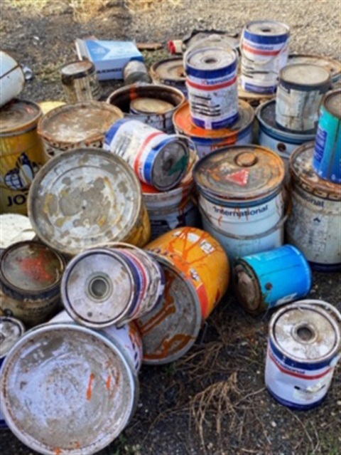 Illegally dumped industrial paint