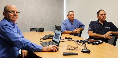 Council officers Drew Stevenson and Mark Hatte, and Councillor Tony Williams look at live images from the North Rocky CCTV cameras.jpg