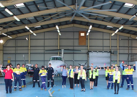 Staff from Rockhampton AIrport, RFDS, and RACQ at the RFDS hangar.jpg