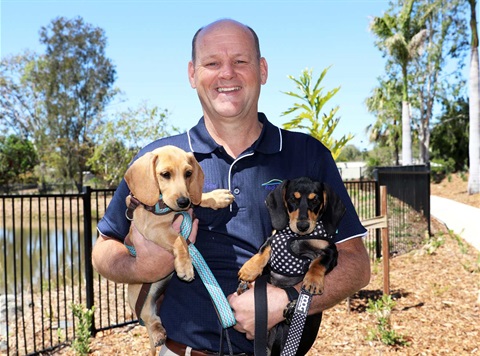 An excellent adventure - Cr Mathers with local pups Bill and Ted.jpg