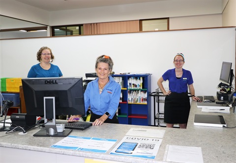 Library staff at the new Customer Service desk.jpg