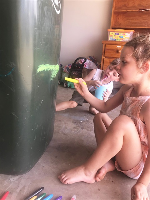 Laela and Xavier painting their bin.jpg
